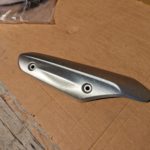 Ersatzteile Suzuki DL650A DL650XA V-Strom VSTROM L2 - L5 Auspuff-Blende exhaust-cover 14781 11J00 YUS DL650A DL650XA V Strom VSTROM L2 L5 Auspuff Blende exhaust cover 3