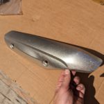 Ersatzteile Suzuki DL650A DL650XA V-Strom VSTROM L2 - L5 Auspuff-Blende exhaust-cover 14781 11J00 YUS DL650A DL650XA V Strom VSTROM L2 L5 Auspuff Blende exhaust cover 4