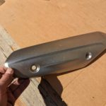 Ersatzteile Suzuki DL650A DL650XA V-Strom VSTROM L2 - L5 Auspuff-Blende exhaust-cover 14781 11J00 YUS DL650A DL650XA V Strom VSTROM L2 L5 Auspuff Blende exhaust cover 7