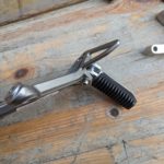 Ersatzteile Suzuki GSF1200N-S WVA9 Sozius-Fussrastentraeger rear footpeg assy Ersatzteile Suzuki GSF1200N-S WVA9 Sozius-Fussrastentraeger rear footpeg assy 43700 32F00 GSF1200N S WVA9 Sozius Fussrastentraeger rear footpeg assy 7