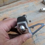 Ersatzteile Suzuki GSF1200N-S WVA9 Sozius-Fussrastentraeger rear footpeg assy Ersatzteile Suzuki GSF1200N-S WVA9 Sozius-Fussrastentraeger rear footpeg assy 43700 32F00 GSF1200N S WVA9 Sozius Fussrastentraeger rear footpeg assy 9